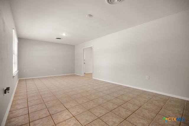 view of tiled spare room