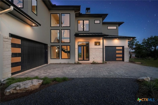 view of front of home featuring a garage