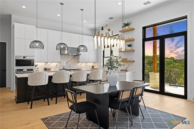 dining room featuring light hardwood / wood-style flooring