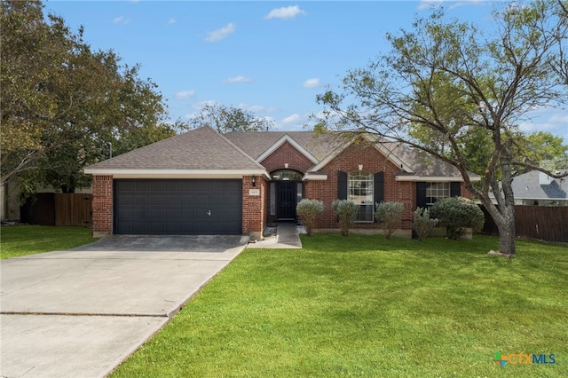 ranch-style home with a garage and a front yard