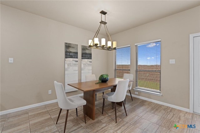 2226 Hayes St, Temple, TX 76502 - dining room with a chandelier and baseboards