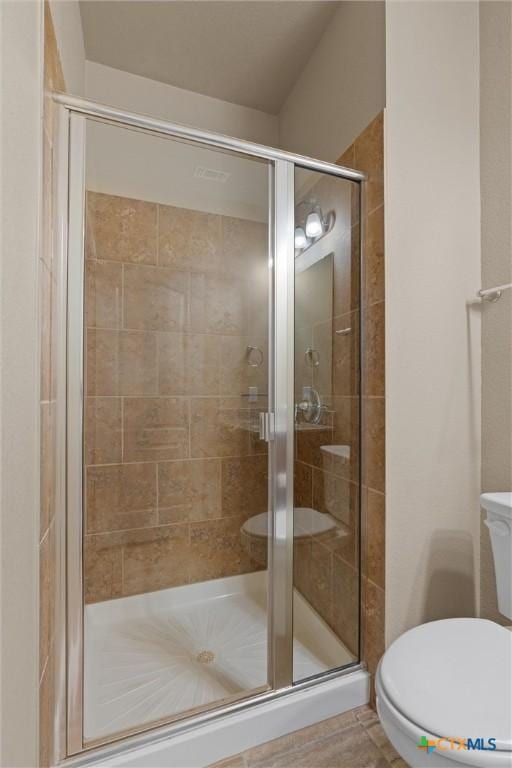 2226 Hayes St, Temple, TX 76502 - full bathroom featuring toilet and a shower stall