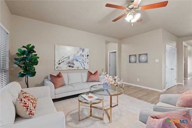 2226 Hayes St, Temple, TX 76502 - living room featuring ceiling fan and light wood-style floors