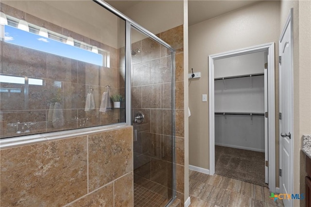 2226 Hayes St, Temple, TX 76502 - bathroom featuring a shower stall and a spacious closet