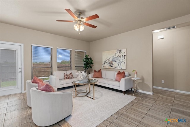 2226 Hayes St, Temple, TX 76502 - living area featuring a ceiling fan and light tile patterned floors