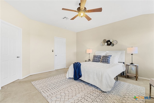 carpeted bedroom featuring ceiling fan