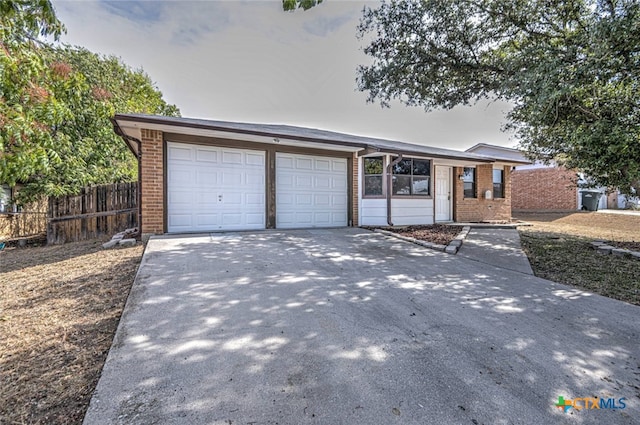 ranch-style home with a garage