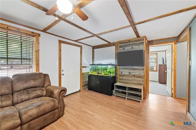 living area with a ceiling fan and light wood-type flooring