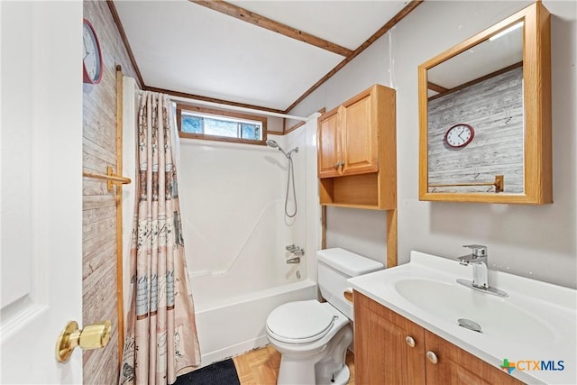 full bathroom with vanity, shower / bath combo, and toilet