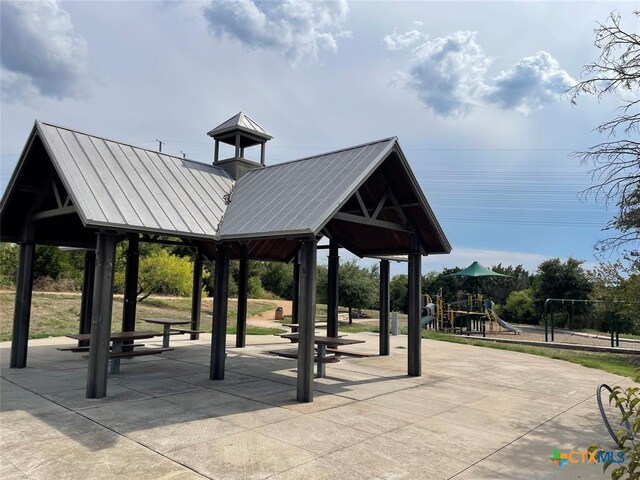 view of home's community featuring a gazebo and playground community