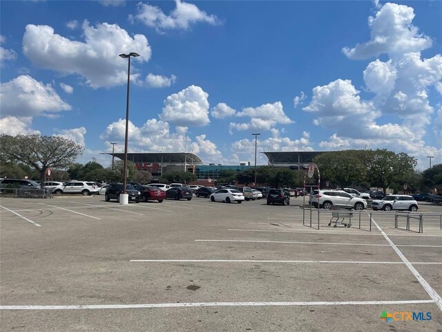 view of uncovered parking lot