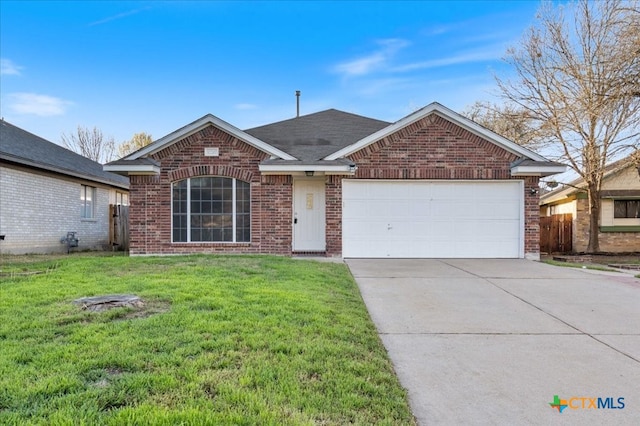 ranch-style house featuring a front lawn, an attached garage, brick siding, and driveway