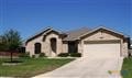 view of front of property with a garage and driveway