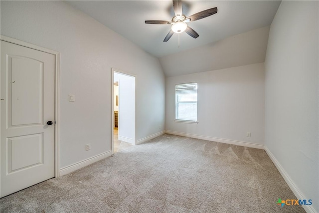 934 Wilderness Trl, New Braunfels, TX 78132 - unfurnished bedroom featuring carpet floors, baseboards, lofted ceiling, and a ceiling fan