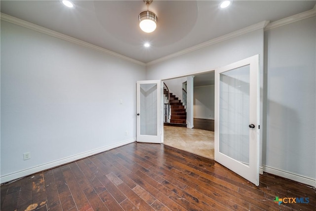 934 Wilderness Trl, New Braunfels, TX 78132 - spare room featuring french doors, wood-type flooring, stairs, baseboards, and crown molding