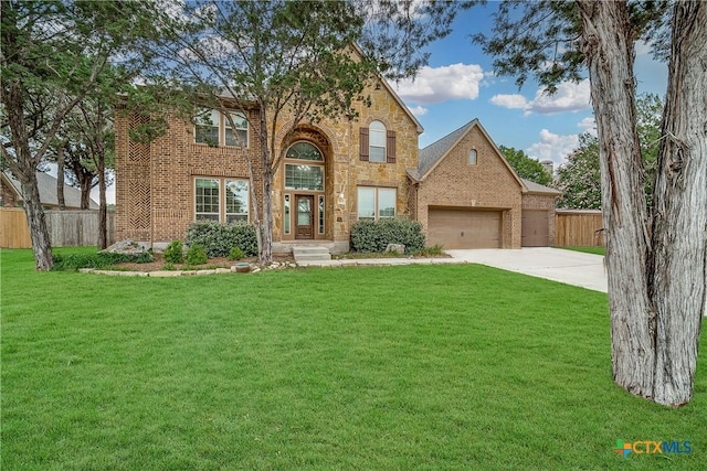 934 Wilderness Trl, New Braunfels, TX 78132 - traditional home featuring brick siding, an attached garage, and driveway