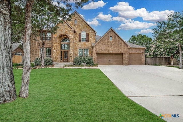 934 Wilderness Trl, New Braunfels, TX 78132 - traditional home with brick siding, an attached garage, and concrete driveway