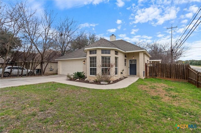 view of front of property featuring brick siding, a front lawn, fence, a chimney, and driveway