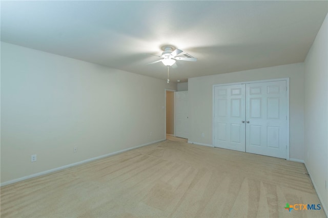 612 Weeping Willow Dr, Temple, TX 76502 - unfurnished bedroom featuring light carpet, a closet, and a ceiling fan