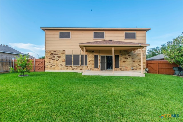 612 Weeping Willow Dr, Temple, TX 76502 - rear view of property with stone siding, a patio area, and a fenced backyard