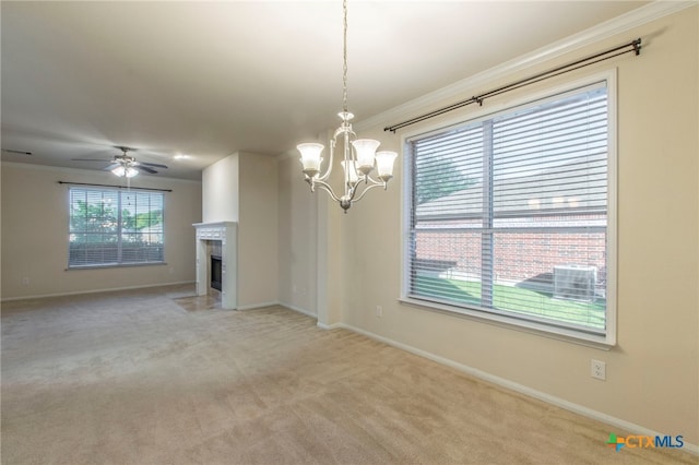 612 Weeping Willow Dr, Temple, TX 76502 - unfurnished living room featuring ornamental molding, a chandelier, a ceiling fan, a fireplace with flush hearth, and light carpet