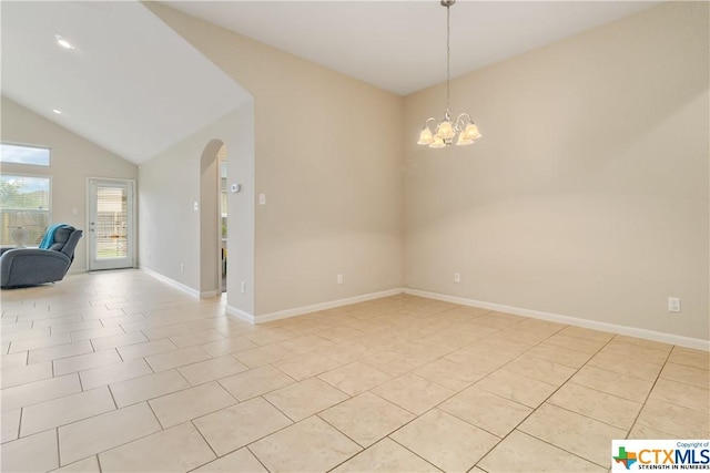unfurnished room with arched walkways, lofted ceiling, light tile patterned floors, a chandelier, and baseboards