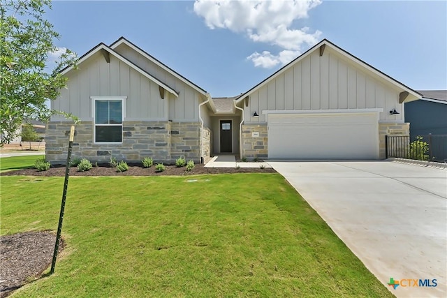 264 Sweeping Sage Ln, San Marcos, TX 78666 - view of front of property featuring board and batten siding, a garage, stone siding, and concrete driveway
