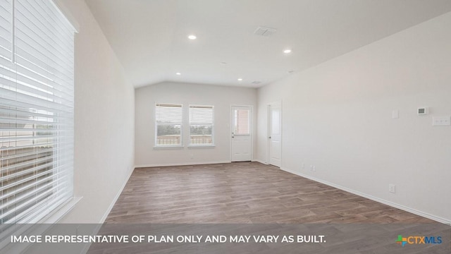 415 Gallaher Bnd, Maxwell, TX 78656 - unfurnished room with wood finished floors, recessed lighting, and lofted ceiling