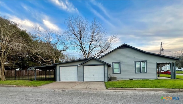 view of property exterior featuring central AC unit, a garage, fence, crawl space, and a lawn