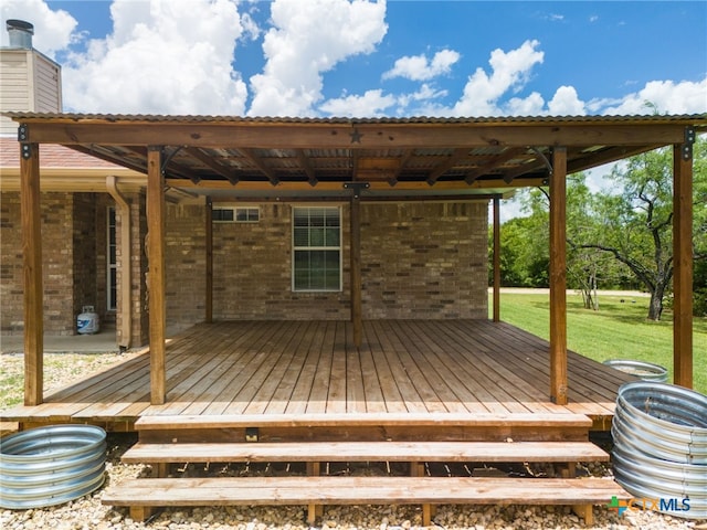 deck featuring a yard