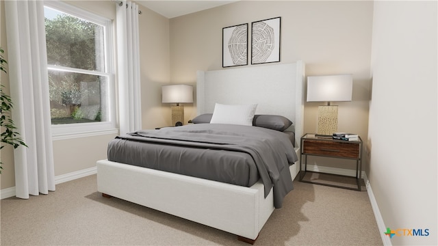 bedroom with light colored carpet