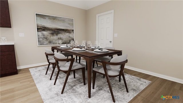 dining room featuring light hardwood / wood-style flooring