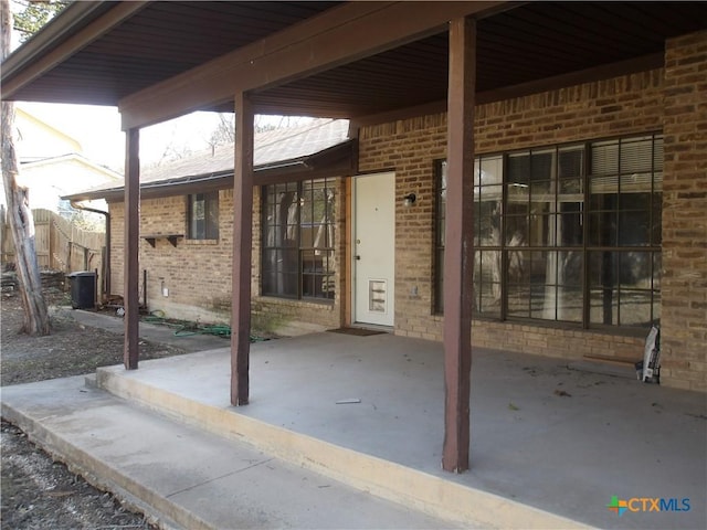 view of patio with fence