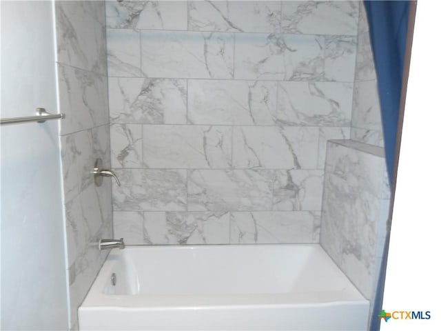 full bathroom with bathtub / shower combination