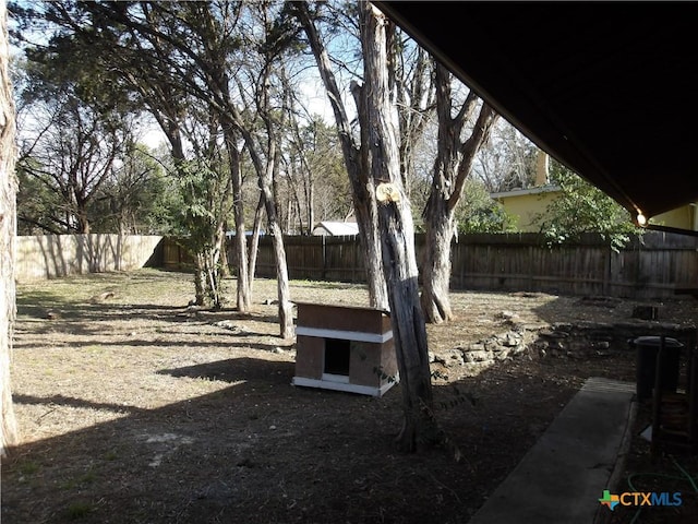 view of yard featuring a fenced backyard