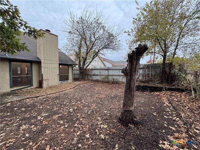 view of yard with fence