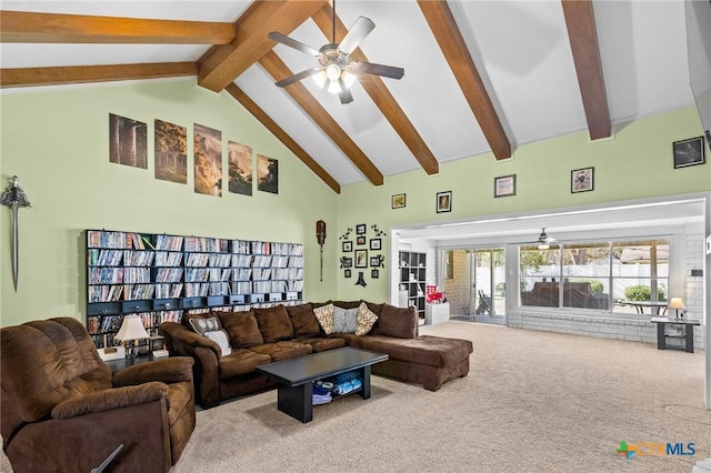 carpeted living room with beamed ceiling, ceiling fan, and high vaulted ceiling