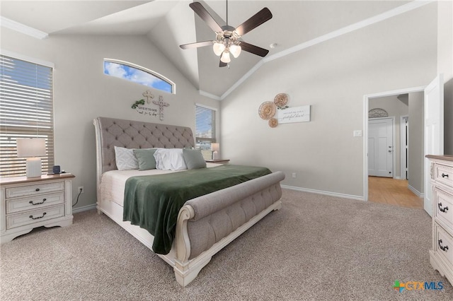 carpeted bedroom featuring ceiling fan, lofted ceiling, and ornamental molding