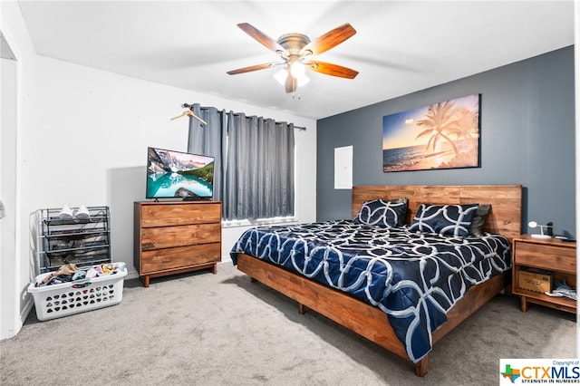 carpeted bedroom with ceiling fan