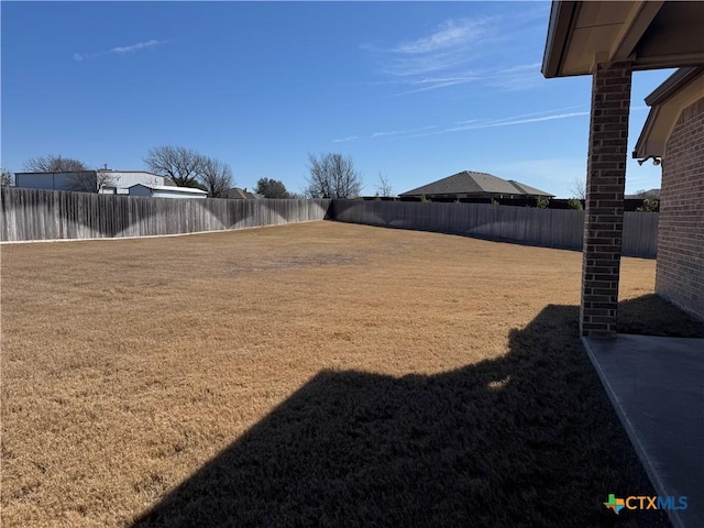 view of yard featuring a fenced backyard