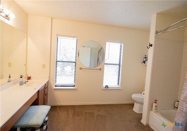 full bathroom featuring vanity, a textured ceiling, toilet, and shower / tub combo with curtain