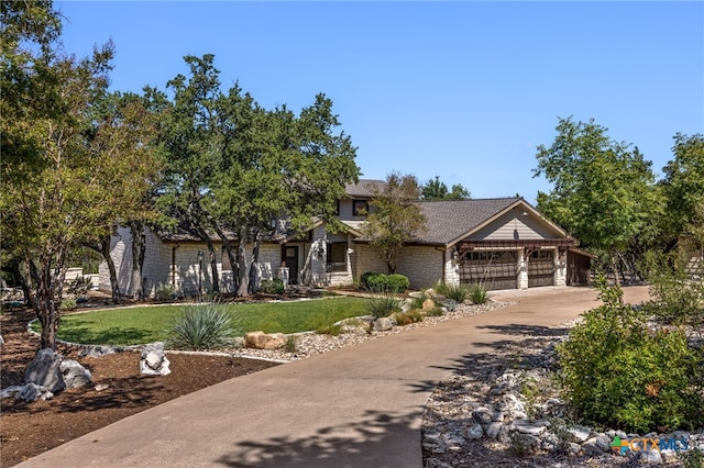 17810 N Rim Dr, Leander, TX 78641 - view of front of home with a front lawn, driveway, and a garage