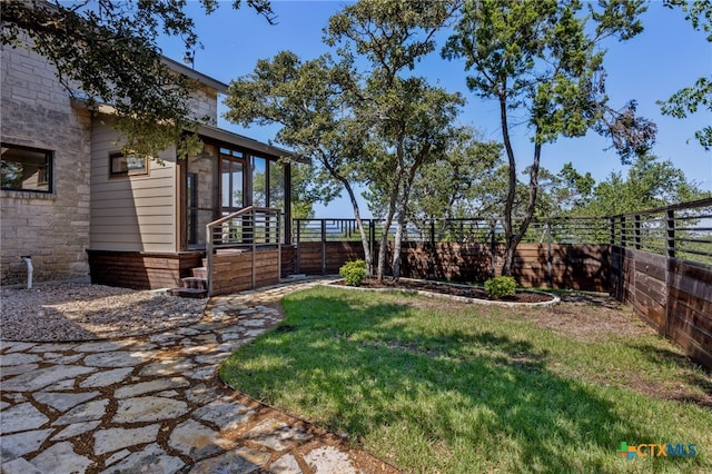 17810 N Rim Dr, Leander, TX 78641 - view of yard with a sunroom