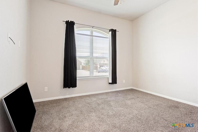 6407 Serpentine Dr, Killeen, TX 76542 - carpeted spare room with baseboards and a ceiling fan