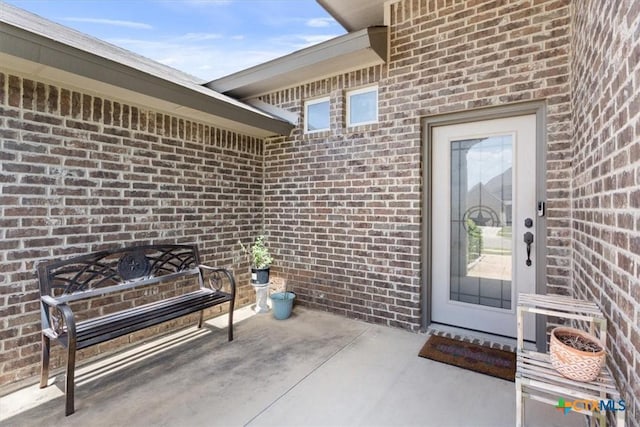 6407 Serpentine Dr, Killeen, TX 76542 - entrance to property with brick siding and a patio area