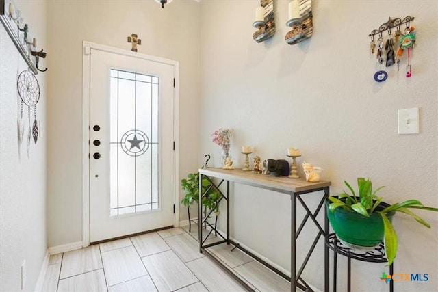 6407 Serpentine Dr, Killeen, TX 76542 - foyer with plenty of natural light and light tile patterned floors