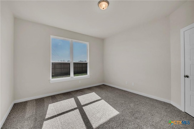 unfurnished room with carpet floors