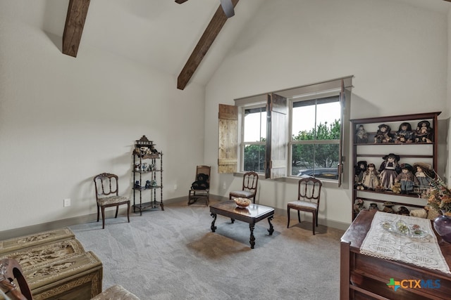 living area with high vaulted ceiling, beamed ceiling, and carpet