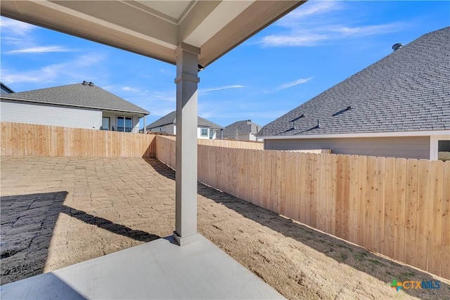 view of patio with a fenced backyard