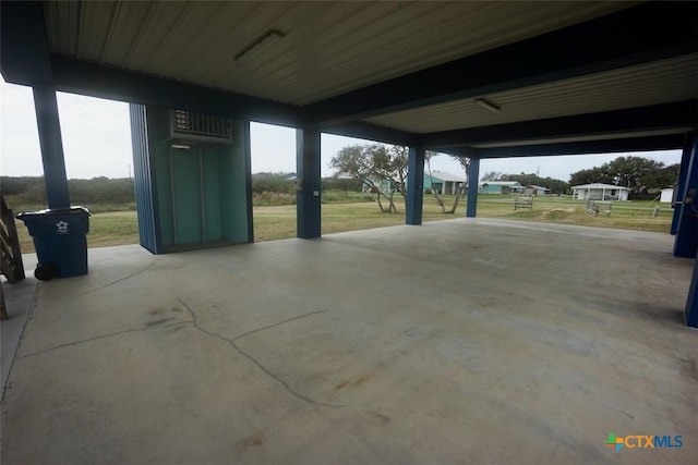 view of patio featuring a wall mounted AC